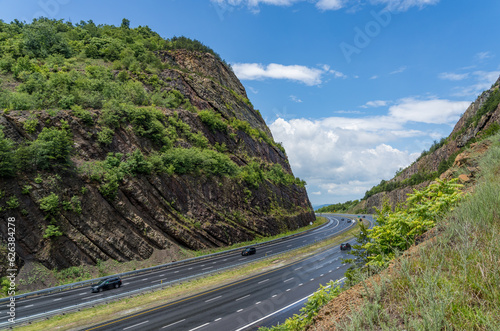 Road through the mountains of Sideling Hill Road Cut for the I68 interstate road to West Virginia photo