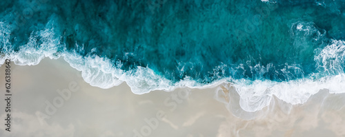 Top view aerial image from drone of an stunning beautiful sea landscape beach with turquoise water with copy space for your text.Beautiful Sand beach with turquoise water,aerial UAV drone shot