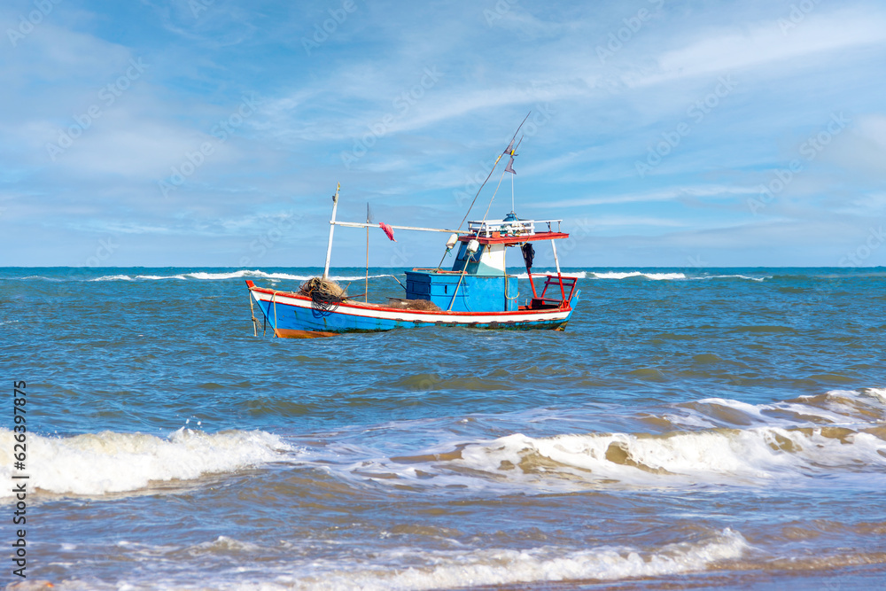 Obraz premium Fisherman's boat at sea. Old fishing boat