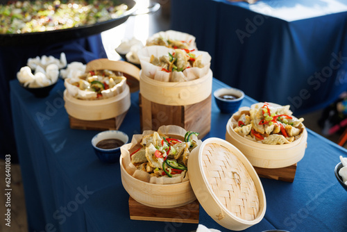 Steamed buns at a catering spread