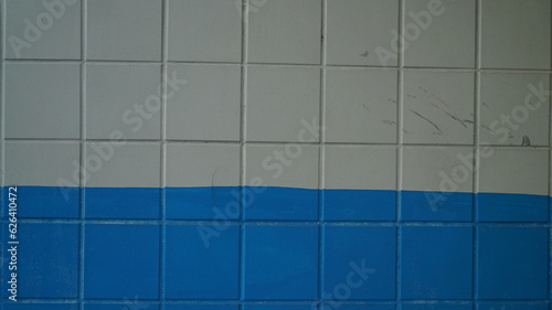 Blue painted white square tiled texture background
