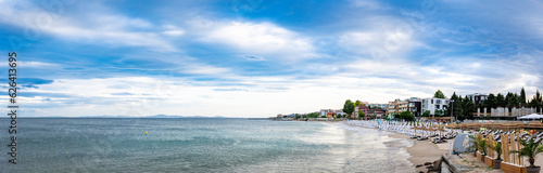 In the southern part of Nesebar, a vacation village situated along the Bulgarian Black Sea coast, the sun began to set on a serene beach during the late afternoon.