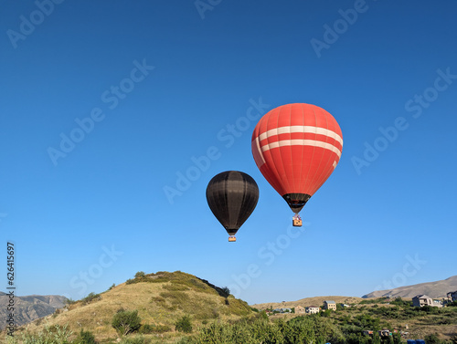 big balloons fly in the mountains of armenia © Наталья Бирюкова