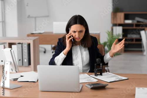 Stressed female accountant ...