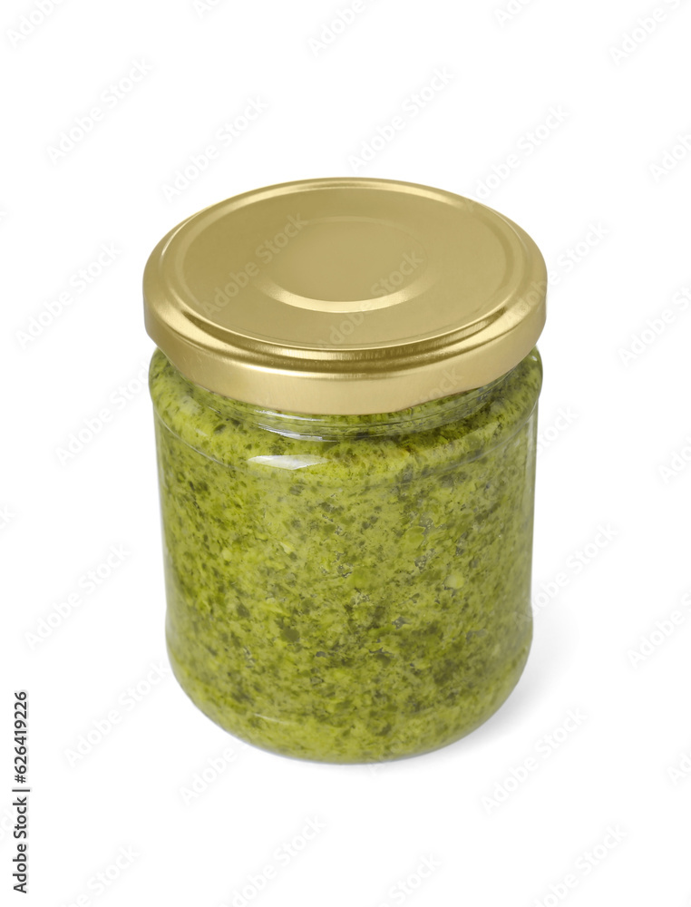 Delicious pesto sauce in jar isolated on white Delicious pesto sauce in jar isolated on white