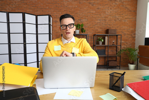Stressed businessman workin...