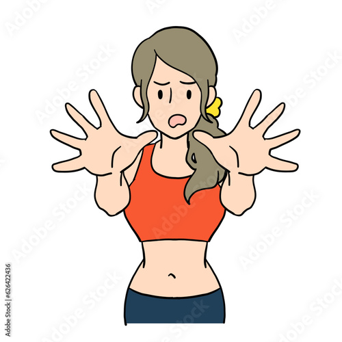 両手で拒絶のジェスチャーをする女性のパーソナルトレーナー