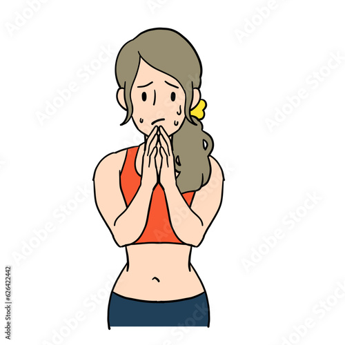 両手を合わせて不安な表情の女性パーソナルトレーナー