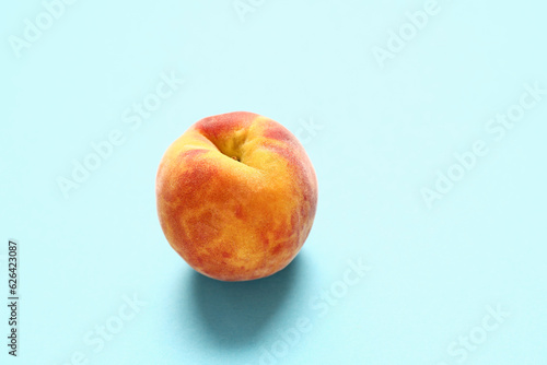 Sweet peach on blue background