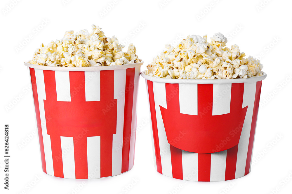 Fototapeta premium Buckets with tasty popcorn on white background