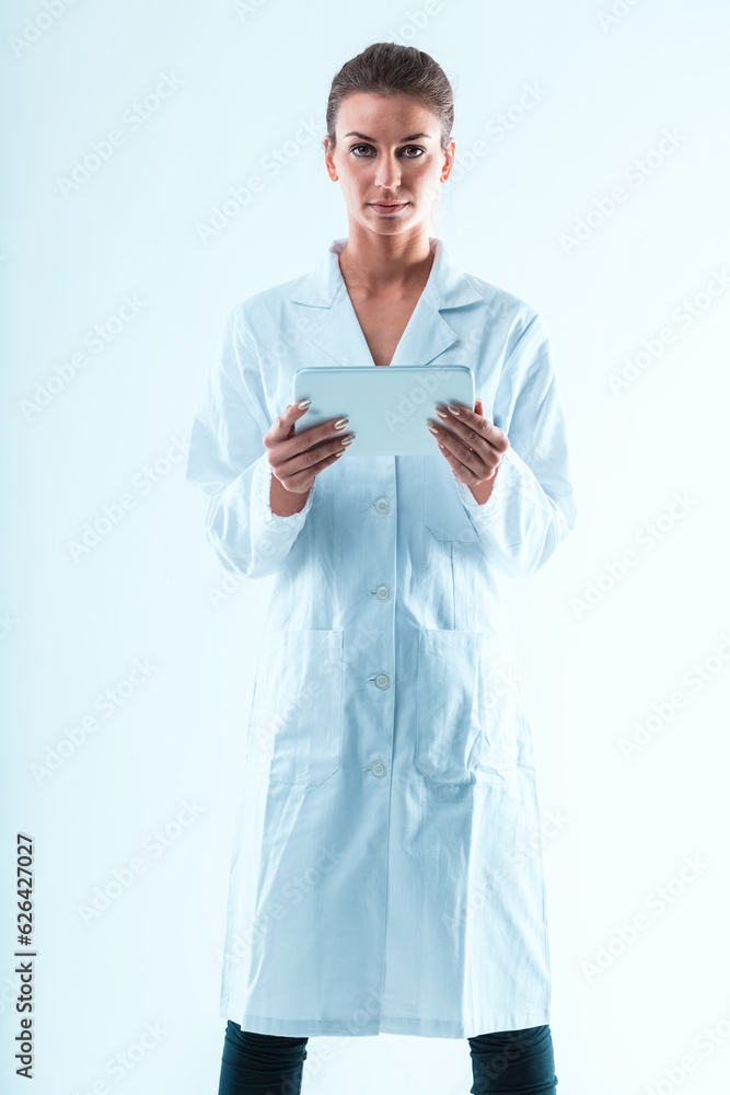 Woman in white, white tablet, STEM expert Woman in white, white tablet, STEM expert