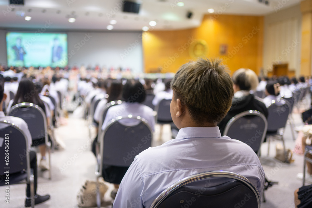 Adult students participating in a seminar in the conference hall Adult students participating in a seminar in the conference hall