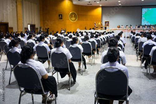 Adult students participating in a seminar in the conference hall