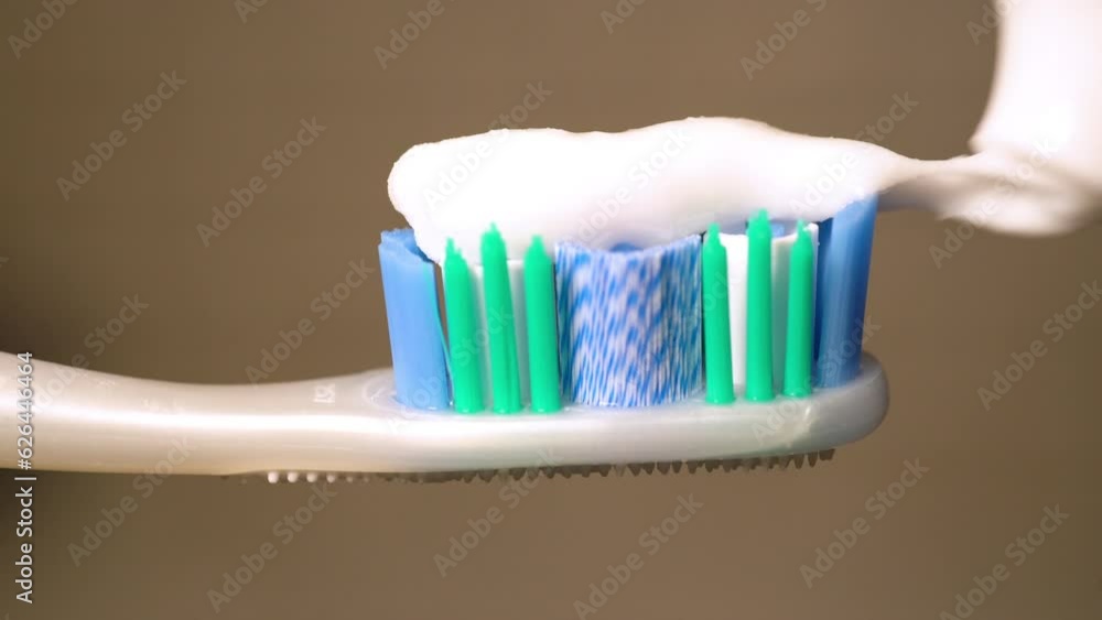 Toothpaste On Toothbrush Close Up. Toothpaste On Toothbrush Close Up.