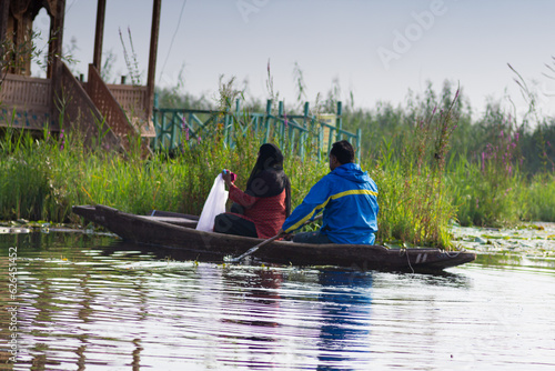 Shikara boat ride in Dal Lake, Kashmir, India photo