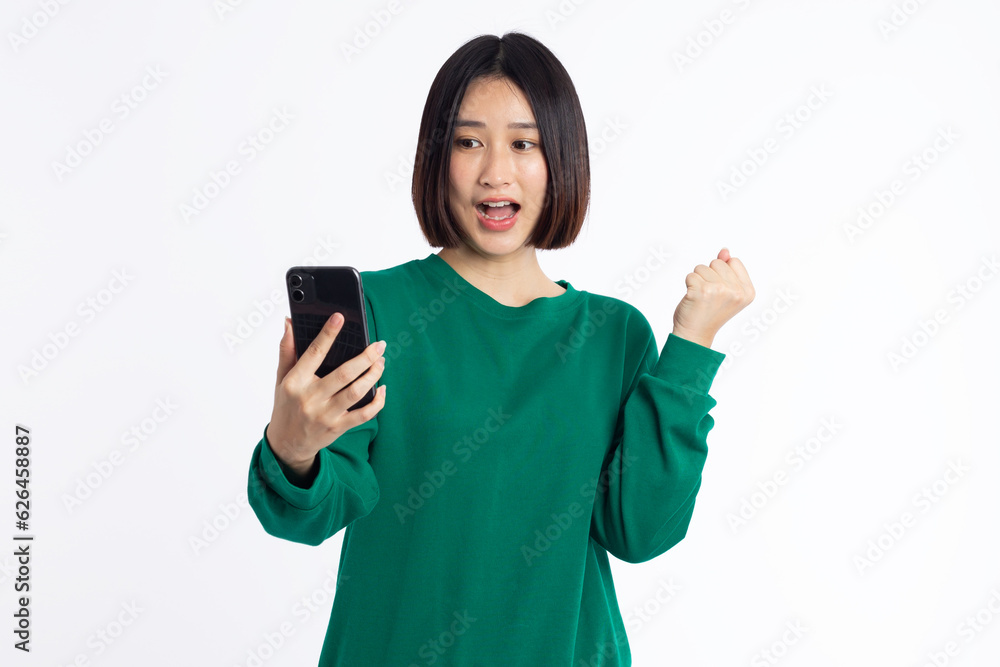 portrait asian young Women are happy while using smartphone isolated on white background portrait asian young Women are happy while using smartphone isolated on white background