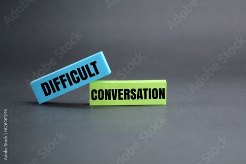 colored paper with the word DIFFICULT CONVERSATION. difficult conversation concepts