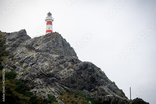 A lighthouse located at cape paliser in Wellington New Zealand. The location is extremely rockey and rugid