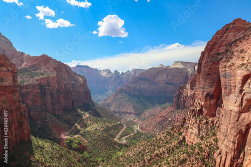 Panoramic aerial view from Zion National Park Canyon Overlook, Utah, USA. Tranquil atmosphere in wilderness. Uninhabited canyon with majestic rock formations and steep cliffs. Mount Carmel highway
