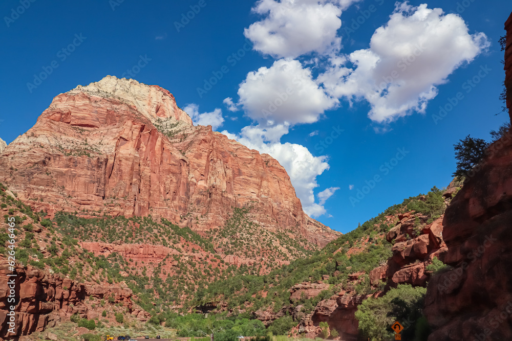 Scenic view of Navajo Sandstone mountain peak Mount Carmel in Zion National Park in Washington County, Utah, United States, USA. Southwest aspect centered, viewed from Springdale. Uninhabited canyon