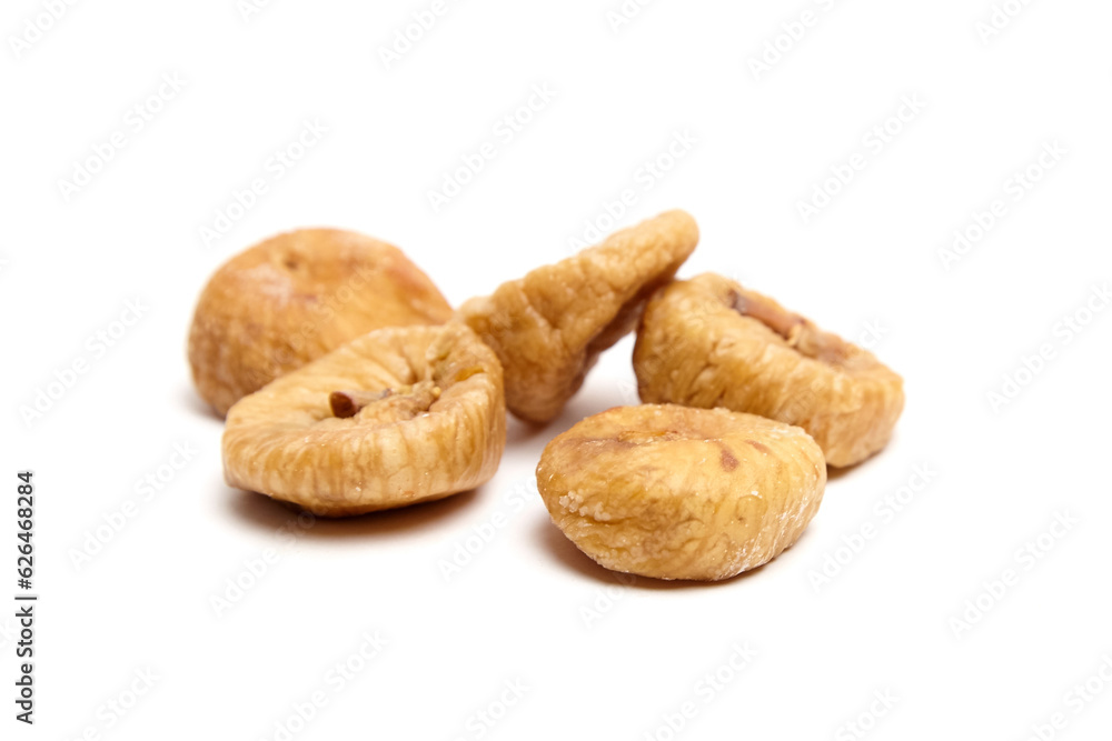 Dried figs isolated on white . Group of sweet sundried fruits