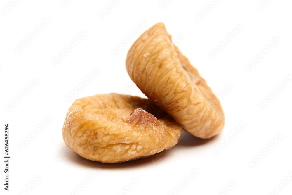 Dried fig fruits isolated on white. Two sweet sundried figs Dried fig fruits isolated on white. Two sweet sundried figs