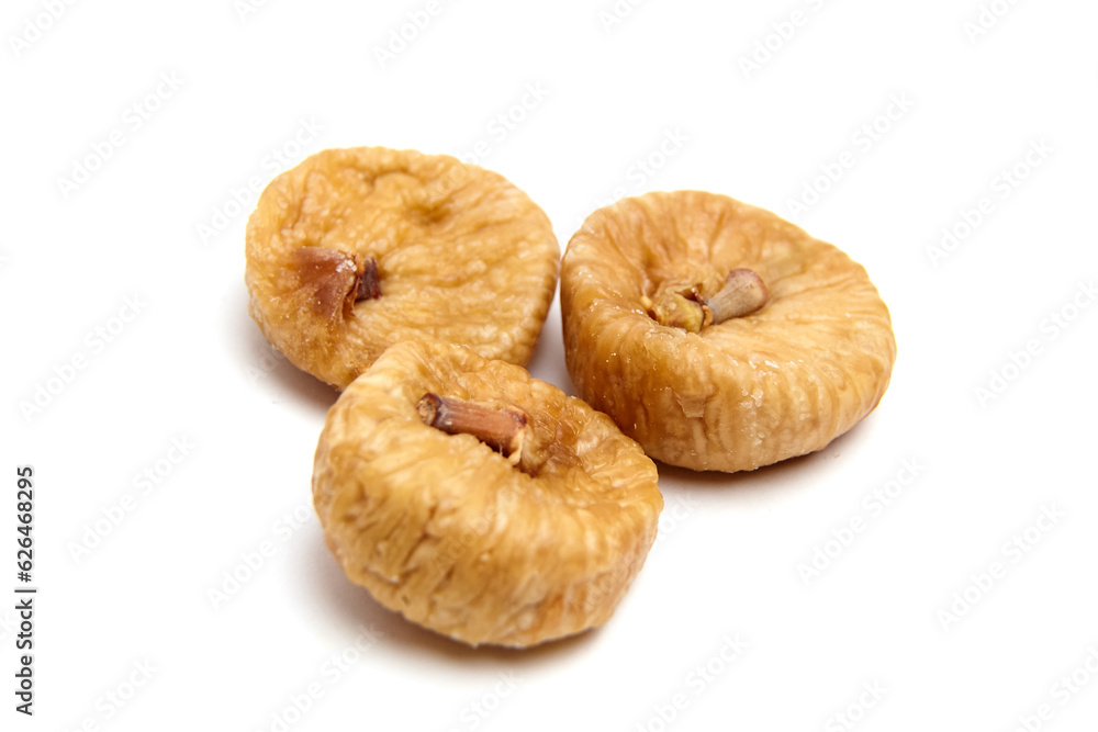 Dried fig fruits isolated on white. Three sweet sundried figs Dried fig fruits isolated on white. Three sweet sundried figs
