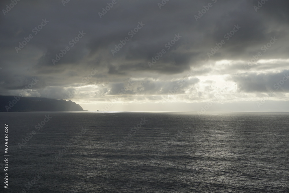 Ocean .Waves wind and clouds. Landscapes of Madeira. Surf. Horizon. Blue sky and clouds. Sunset.