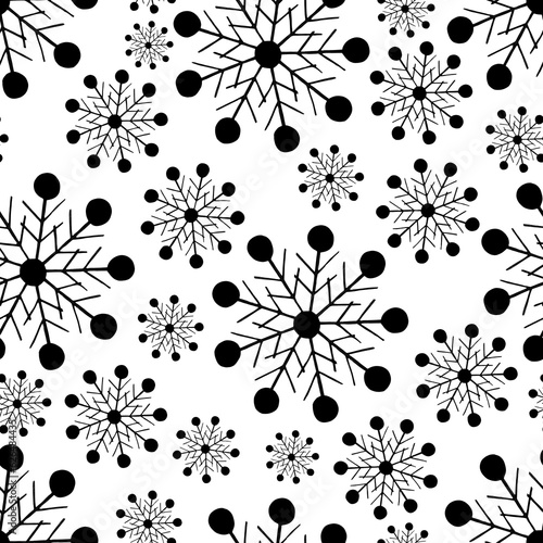 Black and White Seamless Pattern with Hand Drawn Snowflakes.