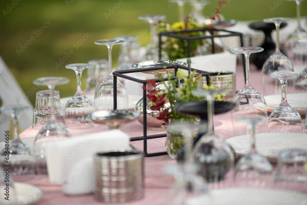 beautiful table setting with flowers and snacks at wedding reception. wedding decorations