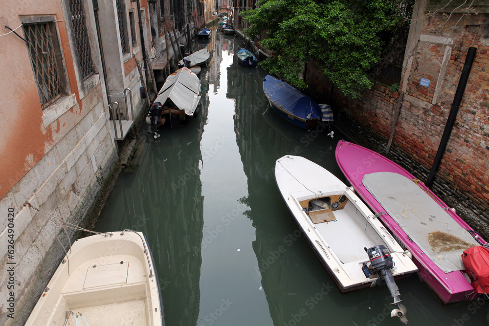 Canal, gondola and typical venezian buildings - Venice - Italy