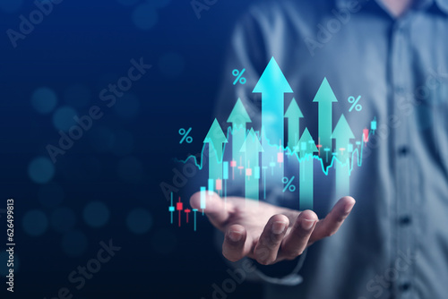 Businessman holding chart value up. finance and investment concept, Capital gain world money economic growth. coin stack financial graph chart, market report on cash currency concept.