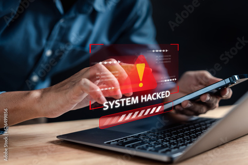 Alert System hacked popup on screen, spam virus with warning caution for notification on internet security protect, code and cyber security and phishing spyware and compromised information... photo