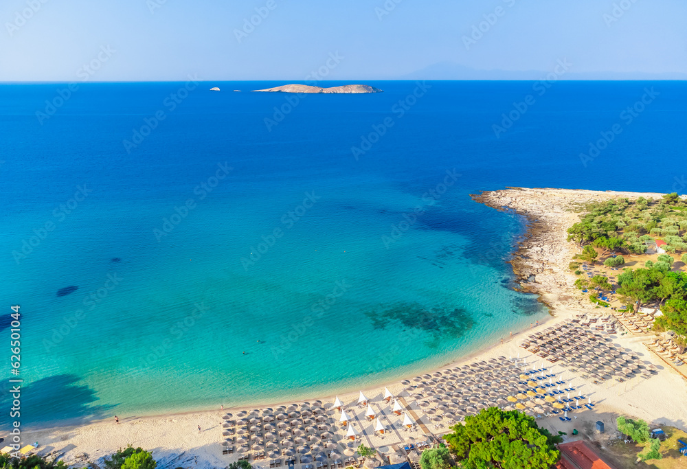 Aerial view of sand beach, azure sea. Psili Ammos Beach, Thassos, Greece