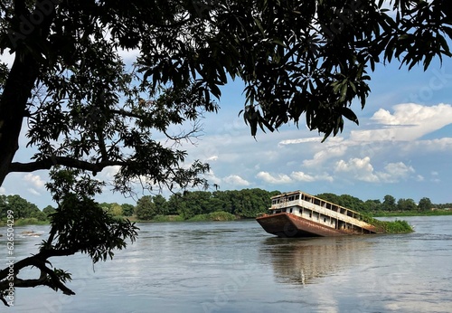 Принти на полотні sunken ferry boat on the white Nile river in the South Sudan capital Juba