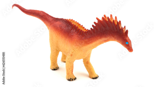 Plastic dinosaur toy isolated on white background