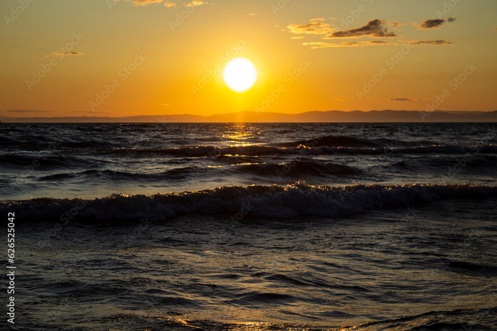 Lake Baikal waves in sunset
