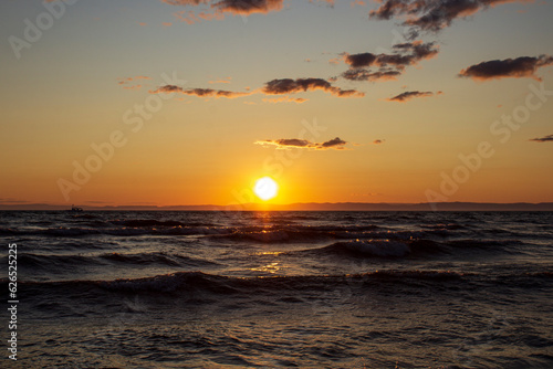 Lake Baikal waves in sunset © Tungalag