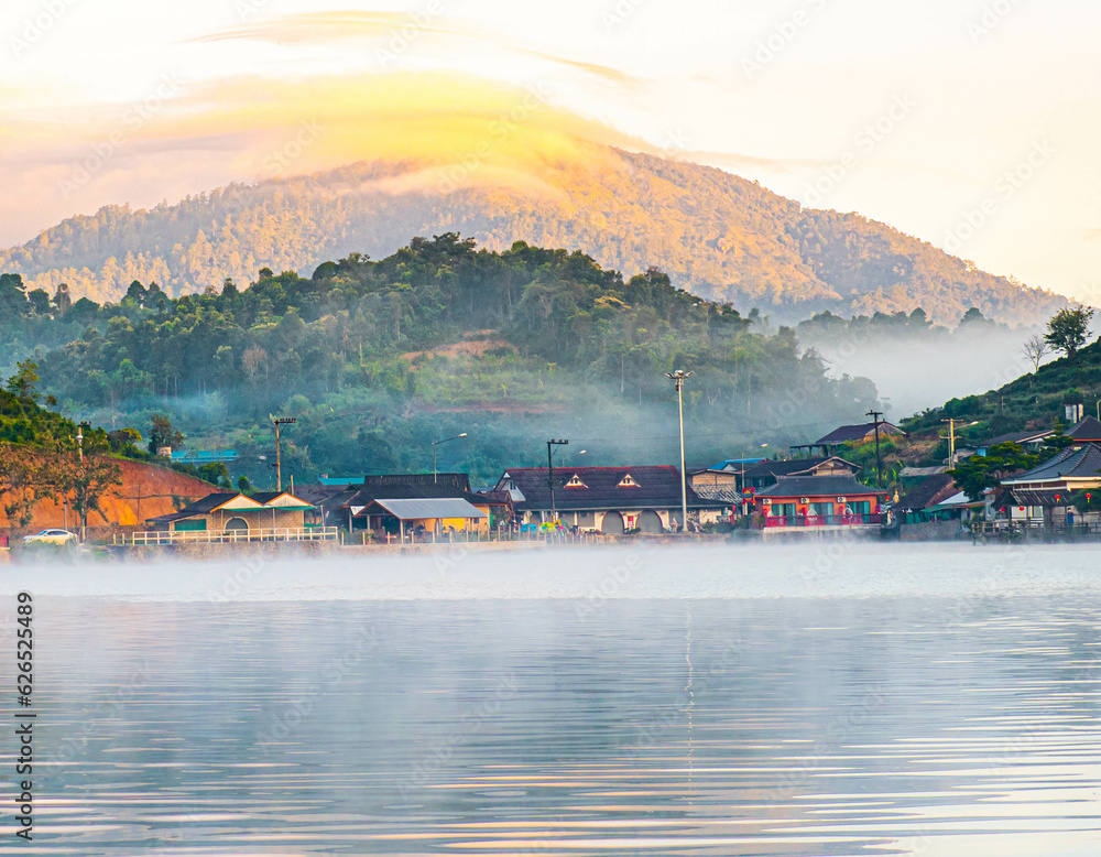Ban Rak Thai is a small highland village nestled in the lush backcountry of Mae Hong Son province in Northern Thailand, Banrakthai. View in the early morning with water steam