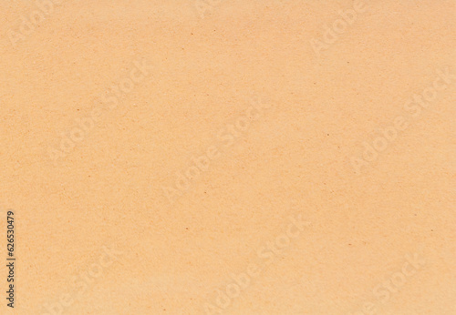 Brown paper texture or cardboard sheet background for design with copy space for text or image.