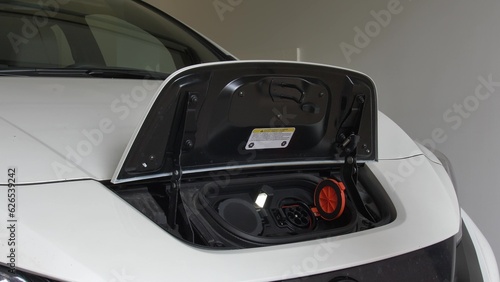 Charging Electric Car With Type 2 Charging Plug Interface Close-Up
