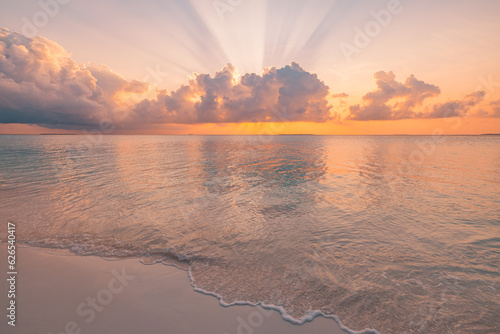 Sea sand sky concept, sunset colors clouds, horizon, horizontal background banner. Inspire nature landscape, beautiful colors, wonderful sun rays, tropical beach. Mediterranean sunset, summer vacation photo