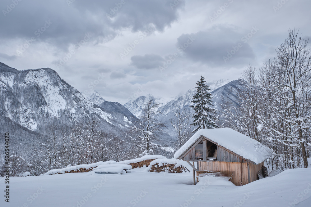 Cabin in snow in Julian Alps, Dovje, Slovenia