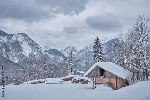 Cabin in snow in Julian Alps, Dovje, Slovenia © Metod
