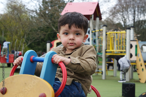 Beautiful Close up Portrait of an Asian Pakistani Baby Boy Named Ahmed Mustafain Haider is Posing at Wardown Public and Children Park of Luton, England UK. Image Was Captured on April 03rd, 2023.	