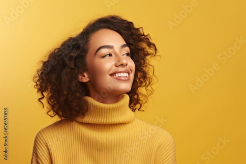 Portrait Of Cheerful African-American Young Woman On Yellow Background.