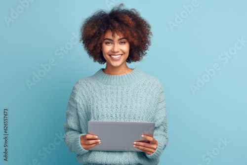 Portrait Of Cheerful Young Woman With Gadget On Copyspace. Girl is Holding Tablet PC.