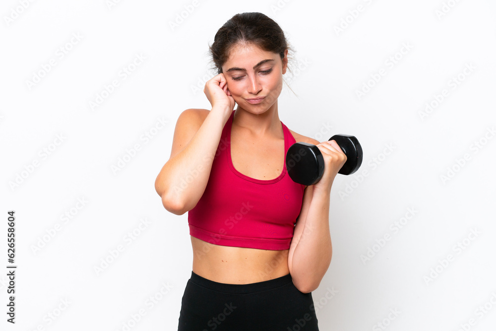 Young sport caucasian woman making weightlifting isolated on white background frustrated and covering ears Young sport caucasian woman making weightlifting isolated on white background frustrated and covering ears