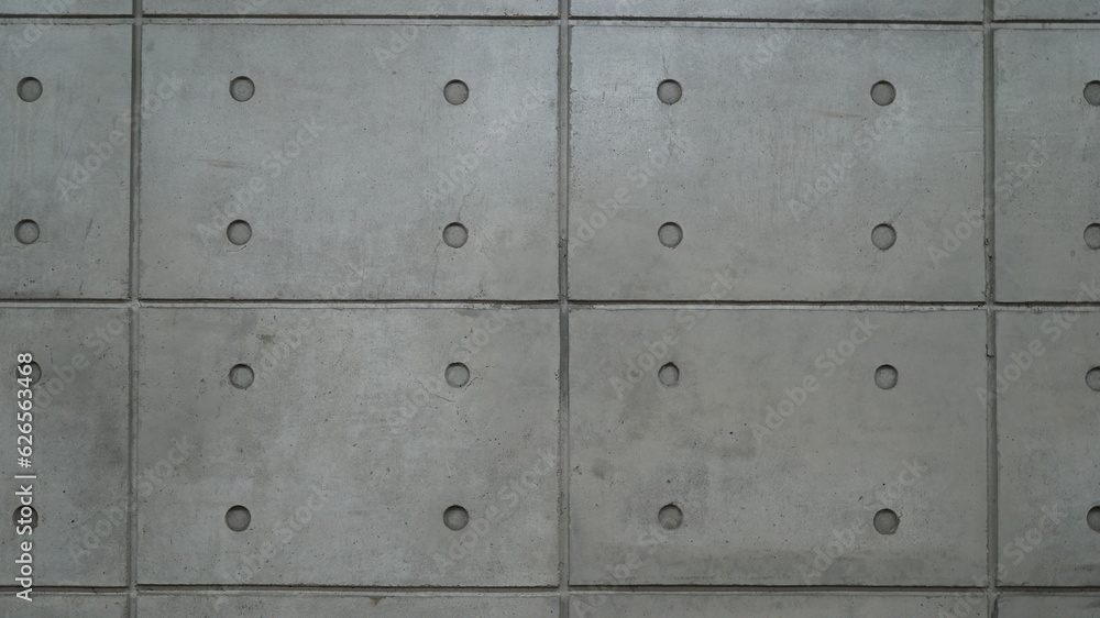 Block wall tile pattern texture of modern building with 4 holes