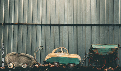 Fotografi Old worn out strollers